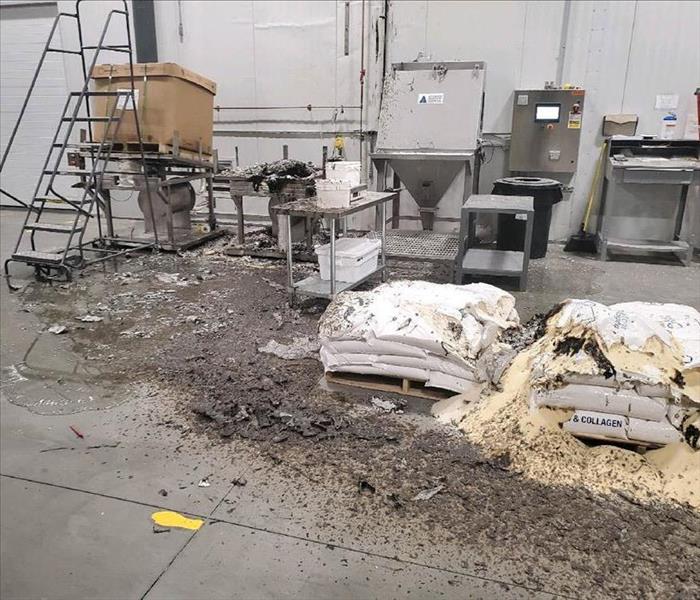 Large pile of soot in warehouse